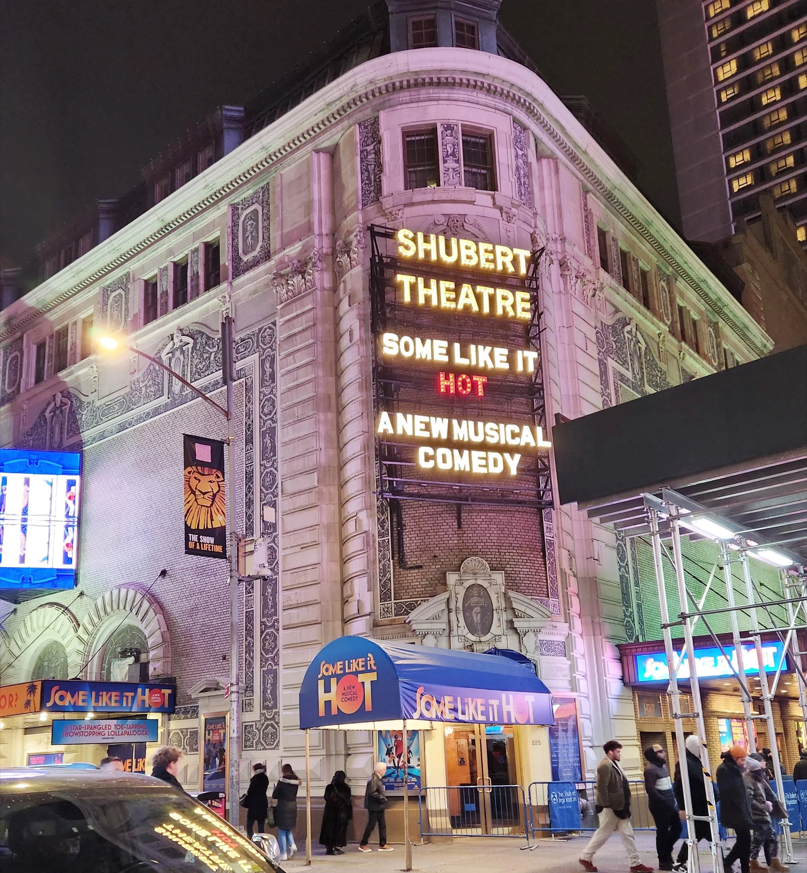 The Shubert Theatre marquee for Some Like It Hot, lit at night.